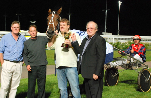 Our Sir Jeckyl after Easter Cup win with owners (L-R) Thomas Allie, Tony Petersen (trainer), Jamie Cockshutt and Steve Allie and driver Ricky Duggan
