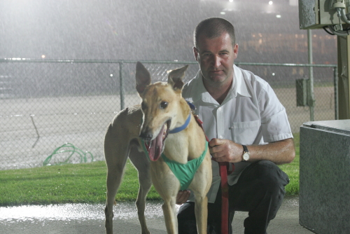 Octane Show with trainer Darren McDonald after the dog set a new 461-metre track record
