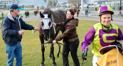 Geegees Blackflash with (L-R) trainer John Luttrell, strapper Nicole Luttrell and a happy jockey Stephen Maskiell
