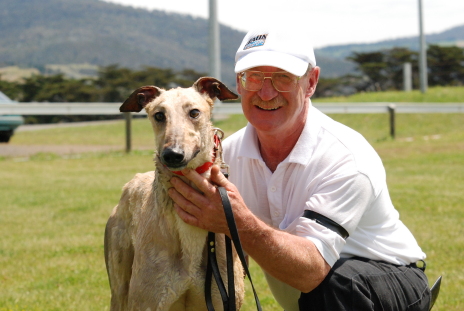 Trainer Leigh Wood with Three Tradies after the dog's win at Tattersall's Park last Tuesday
