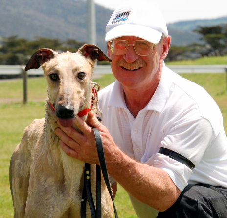 Trainer Leigh Wood with one of his kennel stars Three Tradies
