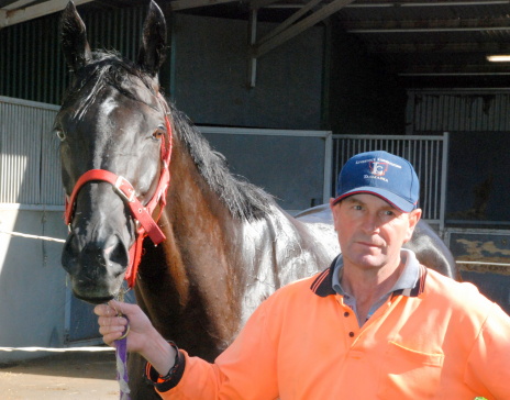 Geeghees Blackflash with trainer John Luttrell at his Brighton stables
