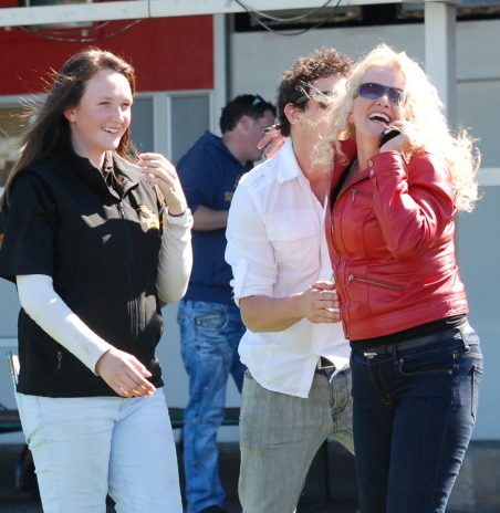 owner Monica Ryan (red jacket) celebrates Si Vite's win with fellow owner Bodie Lucas and Monica's daughter Karly Ryan