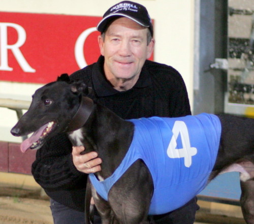 Big Moose with trainer Butch Deverell after one of the dog's feature race wins in Launceston
