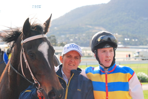 Elle Of Westerly with trainer Tammy Mollross and apprentice Ronan Keogh after the mare's win in Hobart last Sunday
