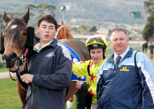 Trainer Andrew Roach (Right), Tremsal and strapper with Thirsty Merc after his impressive and overdue maiden win
