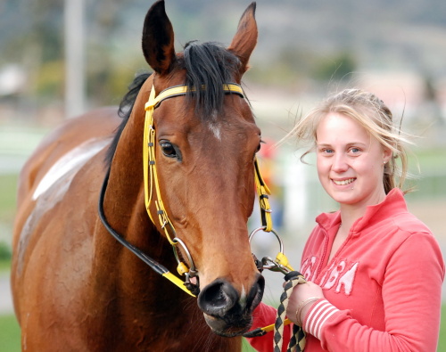 Blue Light with strapper Meagan Luttrell after the mare's latest win
