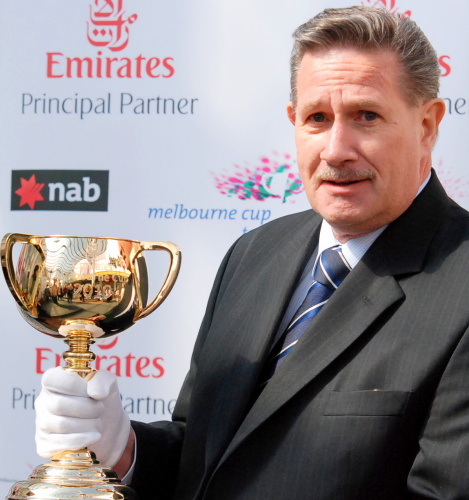 Competition winner Rod Pursell holds the coveted Melbourne Cup
