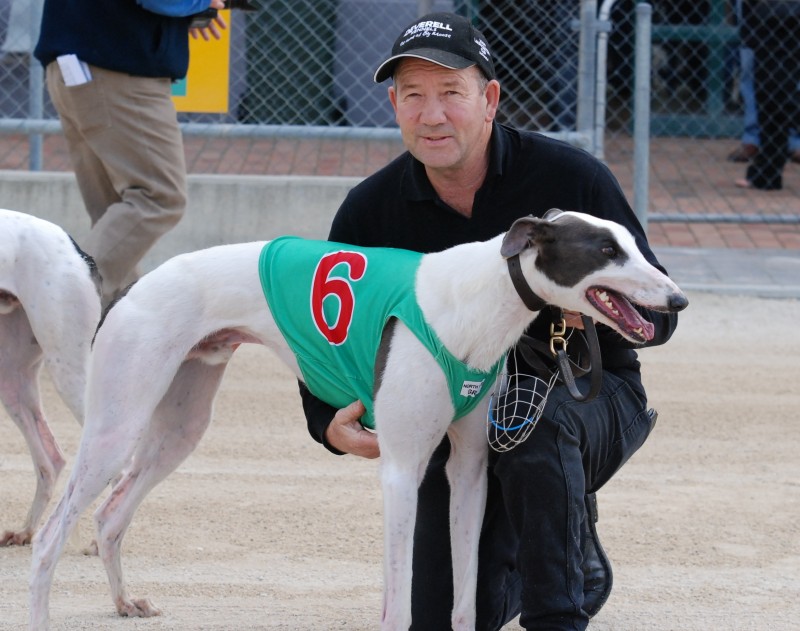 Matt's Entity with trainer Butch Deverell after the dog won the City Of Devonport Cup Invitation today