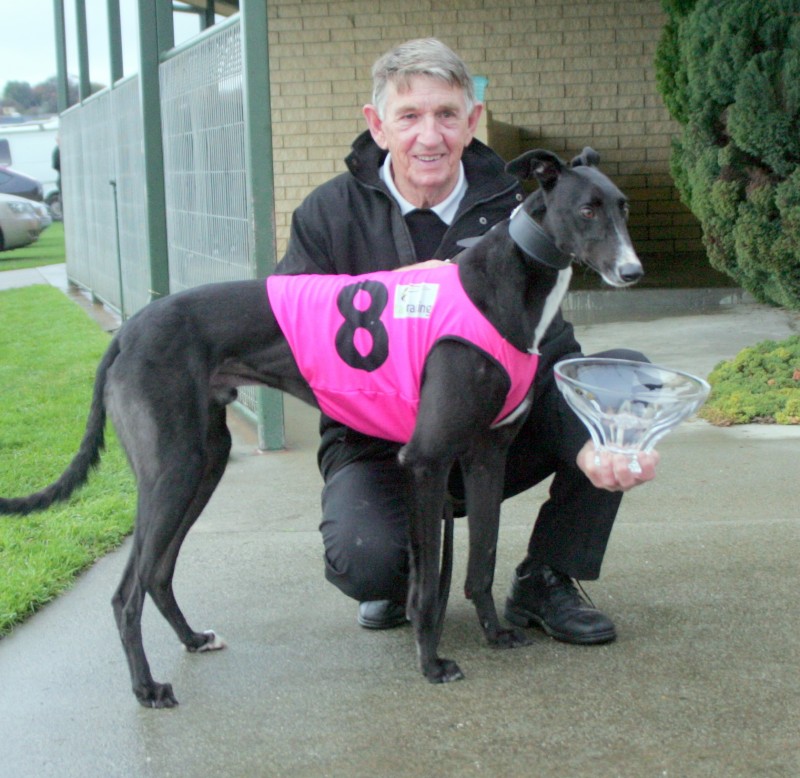 Chicka Scott with trainer Dave Crosswell after the dog's Country Derby win at Devonport