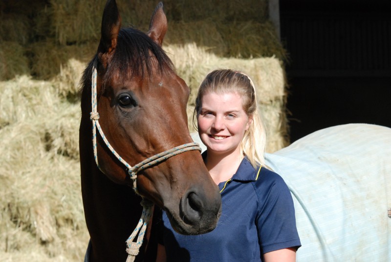 Mister John with stablehand and trackwork rider Sarah Cotton