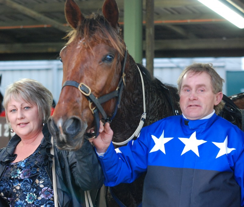 Mister Sumna with trainer Craig Hayes and Tania Hayes