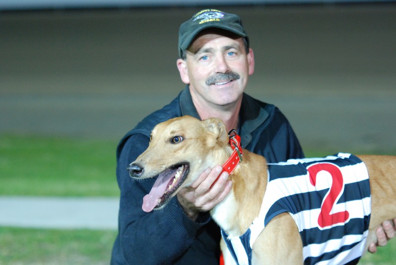 Russell Watts - His pup Juneau looks set to win his first race at Devonport today