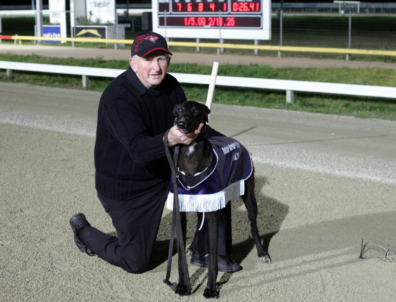 Rip and Tear with handler John Wilton after the dog's Breeders Classic win