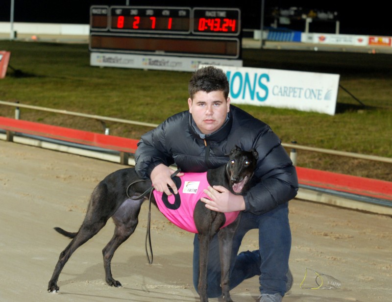 Painted Dotty with handler Blake Pursell after winning state final of National Distance Championship