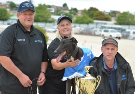 Dark Vito with (L-R) trainer Ted Medhurst and the owners Debbie Cannan and Ian Sewell