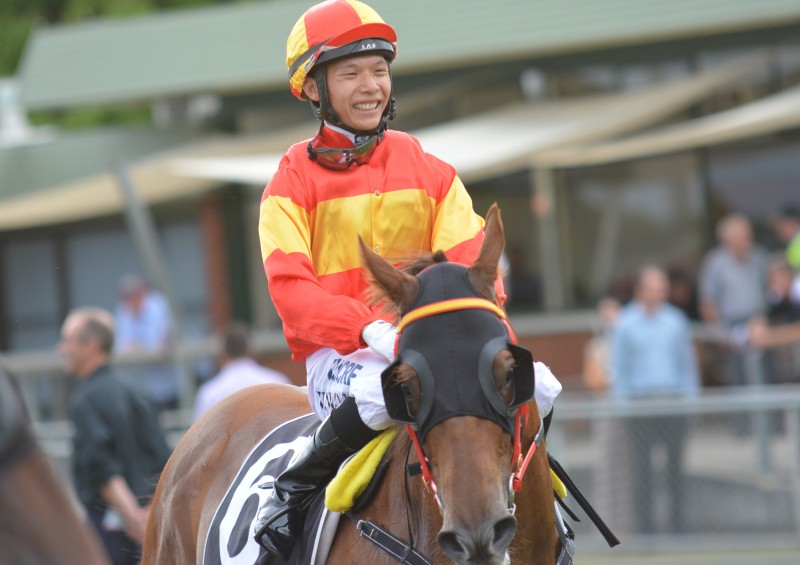 Victor Wong all smiles after winning aboard What A Buzz